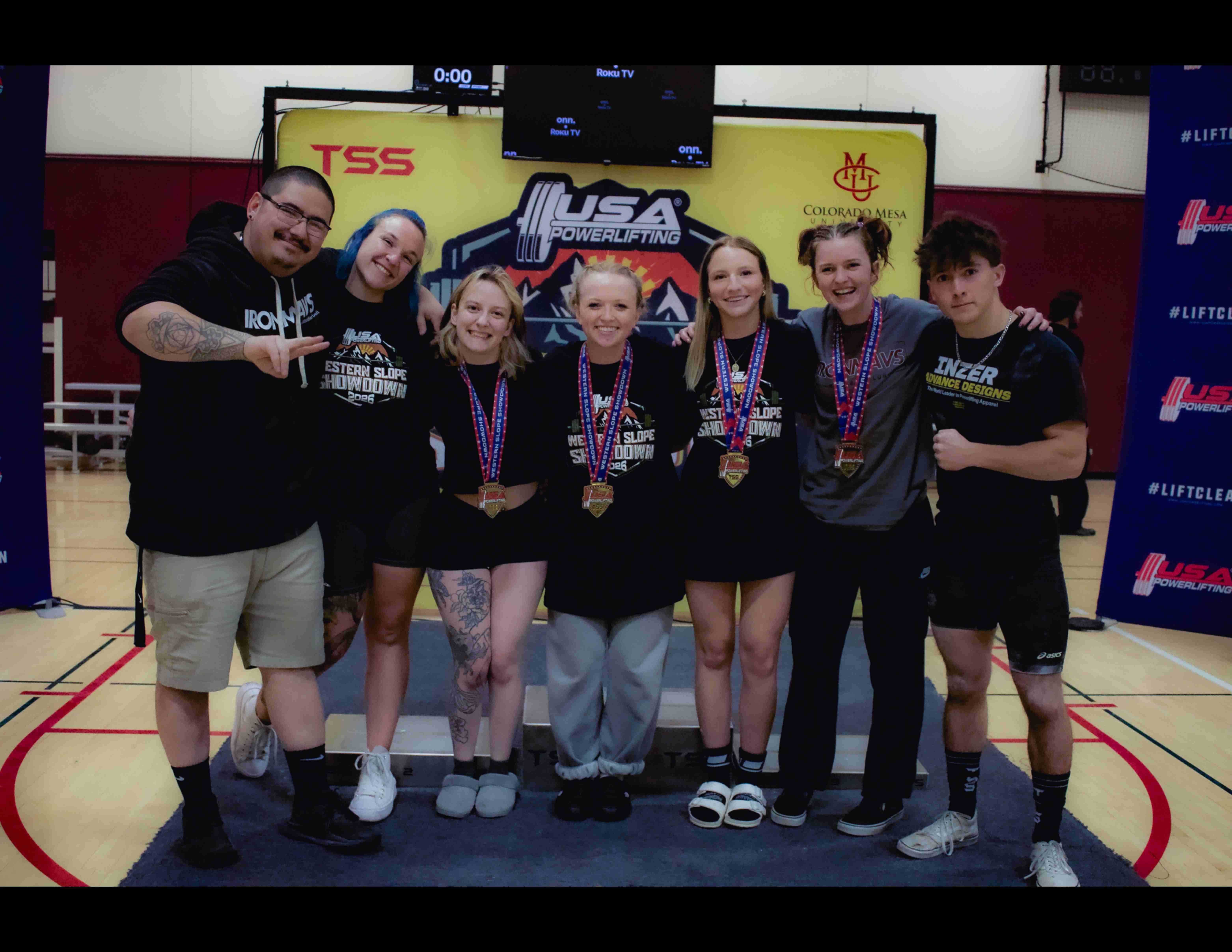 Top Set athletes and coaches together with their medals at the Western Slope Showdown USA Powerlifting meet